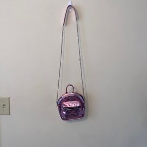 Pink Mini backpack style crossbody bag